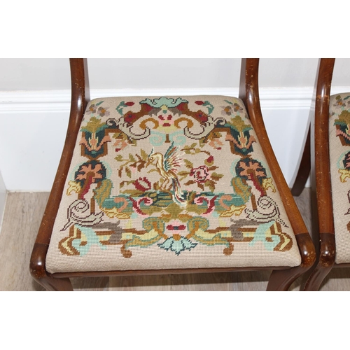 147 - A set of 4 antique style dining chairs with sabre legs and tapestry seats