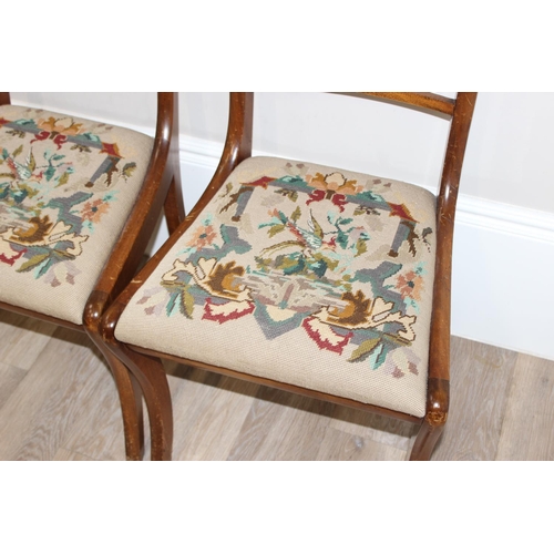 147 - A set of 4 antique style dining chairs with sabre legs and tapestry seats