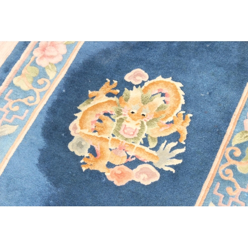 208 - A deep pile Chinese blue wool runner rug, approx 360cm x 71cm