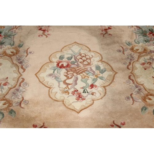 209 - A deep pile beige ground wool rug, likely Chinese, approx 200cm  x 126cm