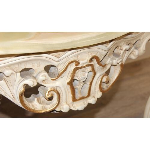 124 - A Baroque style onyx topped low table with painted and gilt wooden base and green onyx shaped top, a... 