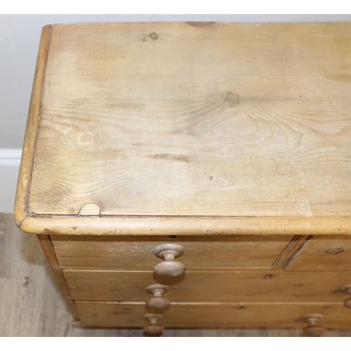 110 - A Victorian pine 2 over 2 chest of drawers with turned wooden feet and bun handles, approx 84cm wide... 