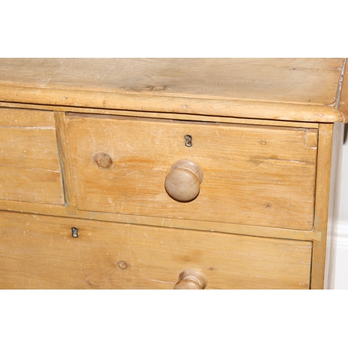 110 - A Victorian pine 2 over 2 chest of drawers with turned wooden feet and bun handles, approx 84cm wide... 