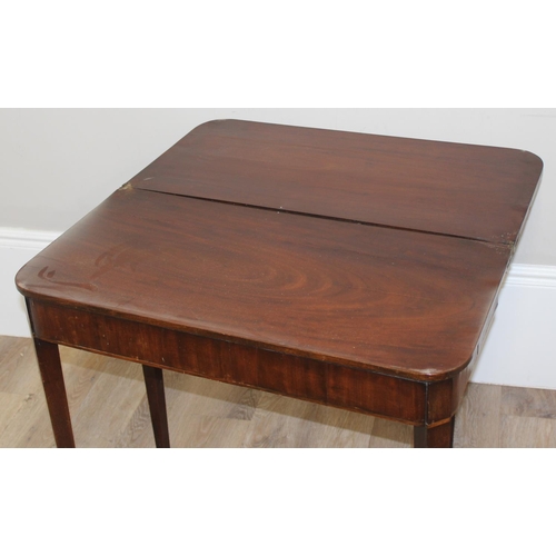 92 - A Victorian mahogany tea table with fold over top, approx 80cm square x 75cm tall