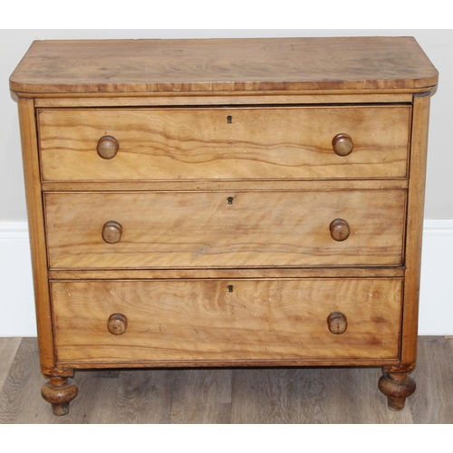 111 - A 19th century light mahogany 3 drawer chest of drawers with turned legs and bun handles, approx 98c... 