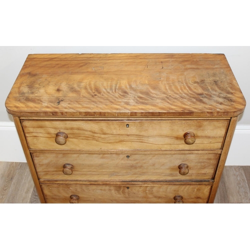 111 - A 19th century light mahogany 3 drawer chest of drawers with turned legs and bun handles, approx 98c... 