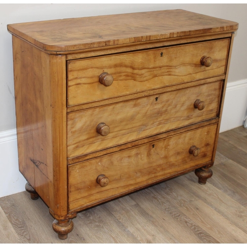 111 - A 19th century light mahogany 3 drawer chest of drawers with turned legs and bun handles, approx 98c... 