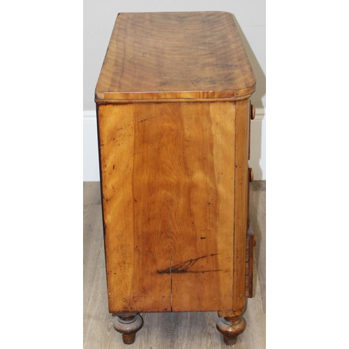 111 - A 19th century light mahogany 3 drawer chest of drawers with turned legs and bun handles, approx 98c... 