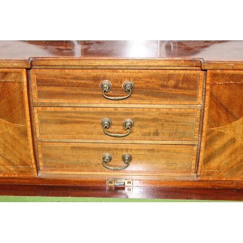 80 - An Edwardian ladies writing desk with various small cupboards and drawers over a green baize lined f... 