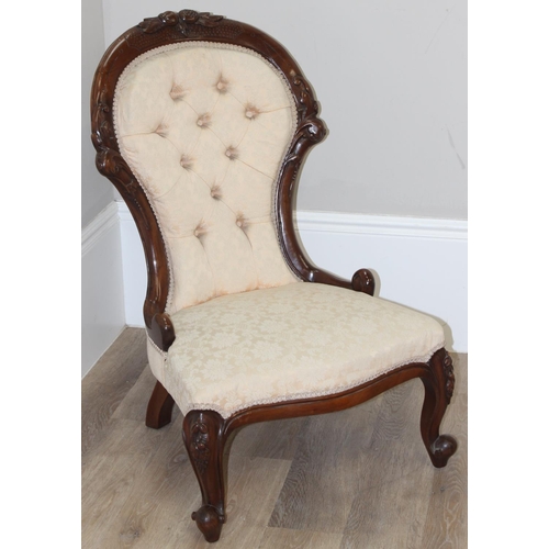 87 - A 19th century button back nursing chair with carved mahogany frame, approx 90cm tall