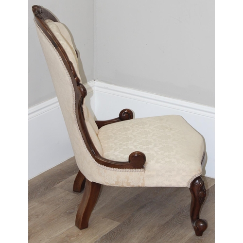 87 - A 19th century button back nursing chair with carved mahogany frame, approx 90cm tall