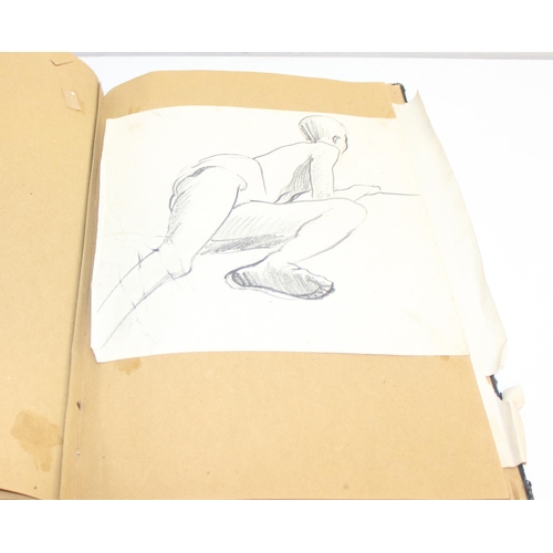 487 - An interesting early-mid 20th century sketchbook, mainly pencil and ink sketches, seemingly by an ar... 