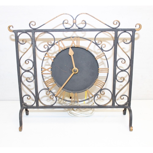 1321 - 3 vintage clocks to inc a slate cased example, anniversary clock, and a wrought metal example, the l... 