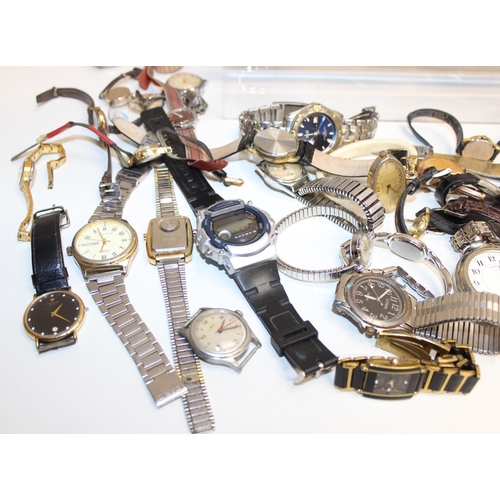 1323 - A large qty of assorted vintage and later watches and other time related items to inc travel clocks,... 