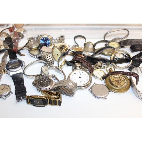 1323 - A large qty of assorted vintage and later watches and other time related items to inc travel clocks,... 