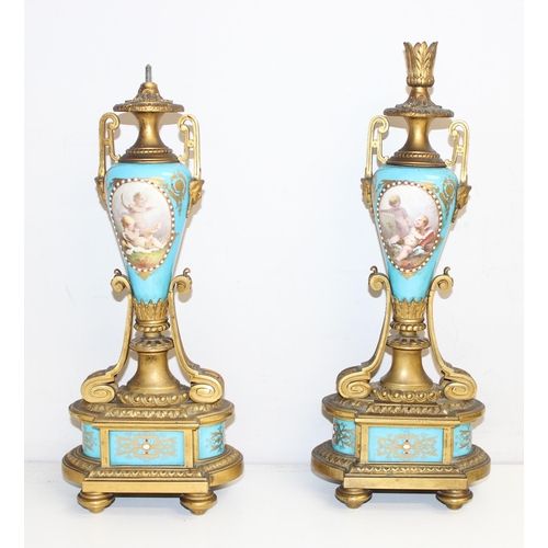 1324 - A 19th century French Ormolu and Porcelain Mounted Striking Mantel Clock garniture, signed Raingo Fr... 