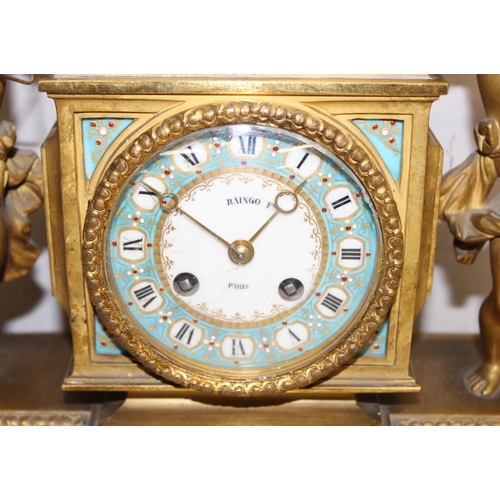 1324 - A 19th century French Ormolu and Porcelain Mounted Striking Mantel Clock garniture, signed Raingo Fr... 