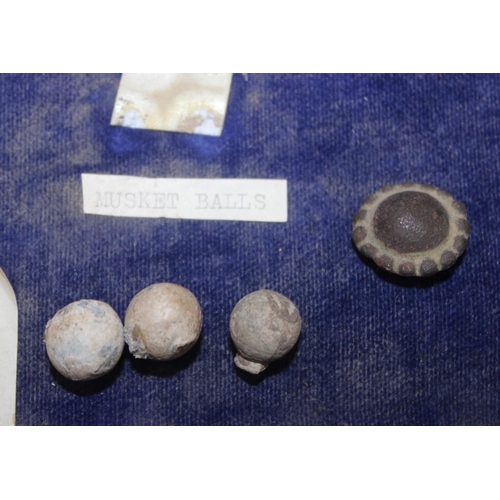 1482 - A framed display of various metal detector finds from Kingston Blount, and some reproduction Roman c... 