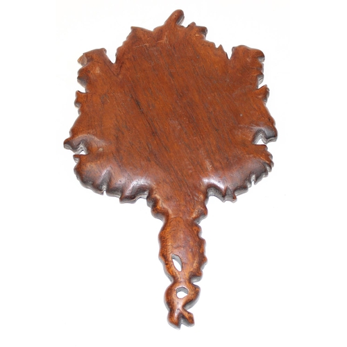 1486 - An antique Black Forest carved wooden hand mirror decorated with oak leaves and acorns, approx 35cm ... 