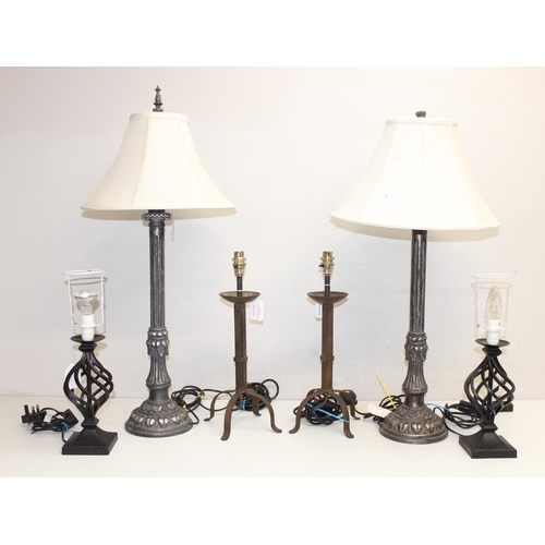 255 - 3 pairs of metal table lamps to include a pair of distressed metal effect table lamps formed as ioni... 