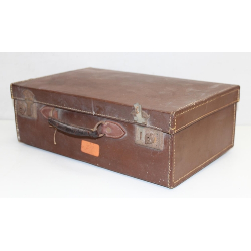 319 - 5 vintage brown leather and leather effect suitcases, largest approx 55cm W x 33cm D x 15cm H