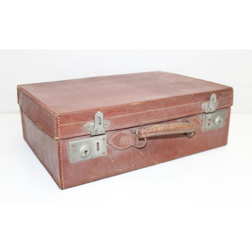 319 - 5 vintage brown leather and leather effect suitcases, largest approx 55cm W x 33cm D x 15cm H