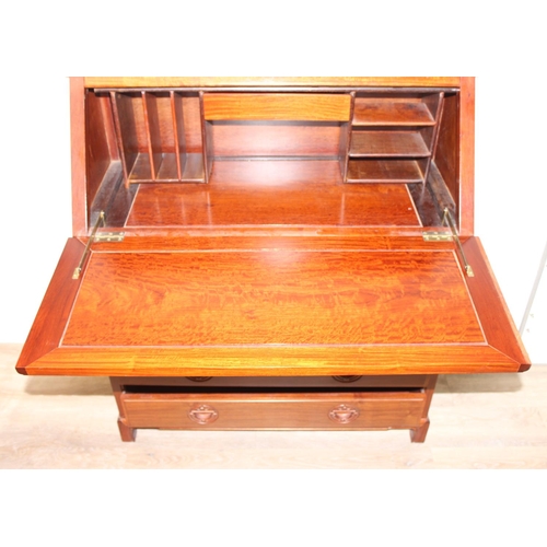 64 - A 20th century Chinese hardwood bureau with drop down front and 2 over 3 drawers to base, carved Chi... 