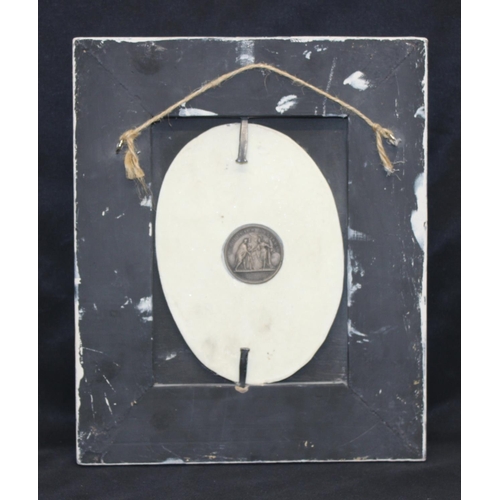 459F - An antique style reconstituted marble plaque in distressed white painted frame, the relief plaque de... 