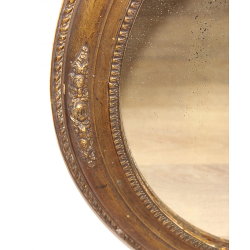 548 - Antique oval gilt framed mirror with rope twist border and floral decoration, approx 50cm W x 58cm H