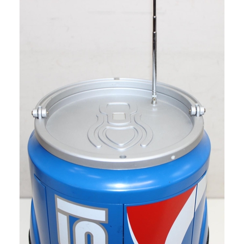 697 - 2 novelty radios, one formed as a Pepsi can, the other a vintage fuel pump, the largest approx 58cm ... 