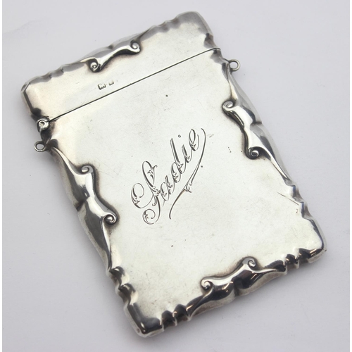 1004 - An Edwardian silver visiting card case with engraved name 