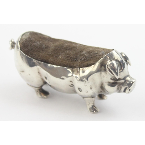 1012 - An Edwardian silver pin cushion formed as a pig, Birmingham 1906 by Levi & Salaman, approx 55mm wide