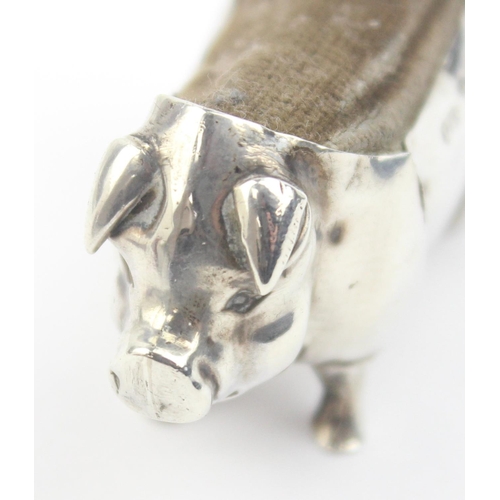 1012 - An Edwardian silver pin cushion formed as a pig, Birmingham 1906 by Levi & Salaman, approx 55mm wide