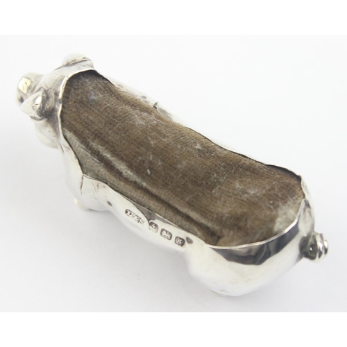 1012 - An Edwardian silver pin cushion formed as a pig, Birmingham 1906 by Levi & Salaman, approx 55mm wide