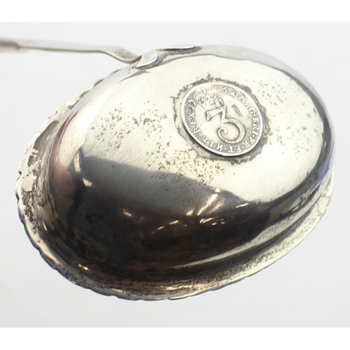 1015 - A George III period silver toddy ladle set with a 1762 silver threepence coin, the body unmarked but... 