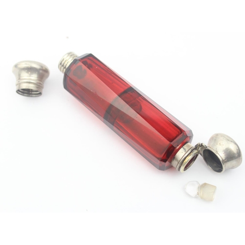 1017 - An antique silver plated and ruby glass double ended scent bottle, approx 12cm wide