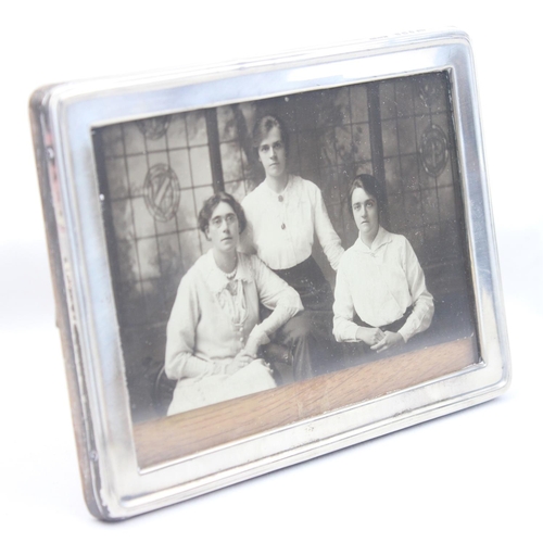 1019 - An antique silver mounted photograph frame with oak back, Birmingham 1915 by A & J Zimmerman, approx... 