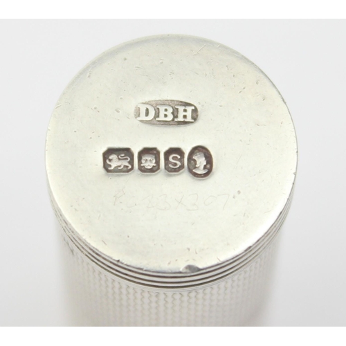 1031 - A vintage silver lipstick holder with engine turned finish, marked for London 1953 by Dyas Beverley ... 