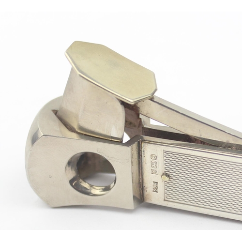 1035 - A silver mounted cigar cutter, Birmingham 1979 by SJ Rose, approx 15cm long