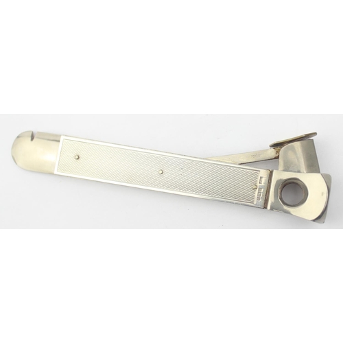 1035 - A silver mounted cigar cutter, Birmingham 1979 by SJ Rose, approx 15cm long