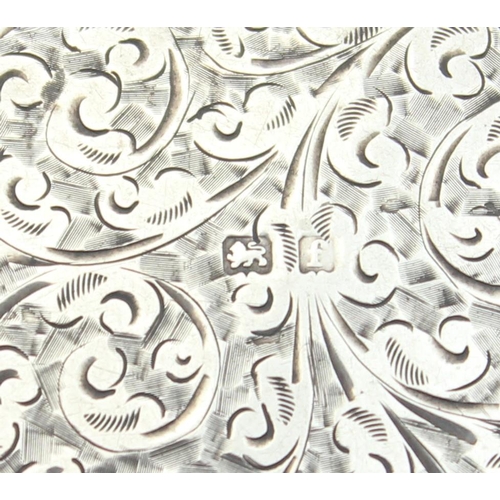 1039 - An Edwardian silver purse or card holder with acanthus scroll engraving and chain holder, marked for... 