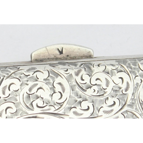 1039 - An Edwardian silver purse or card holder with acanthus scroll engraving and chain holder, marked for... 