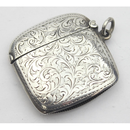 1041 - An antique silver vesta case with acanthus engraved scrolls, rounded form, marked for Chester 1909 b... 