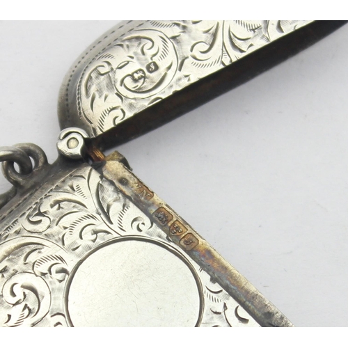 1041 - An antique silver vesta case with acanthus engraved scrolls, rounded form, marked for Chester 1909 b... 