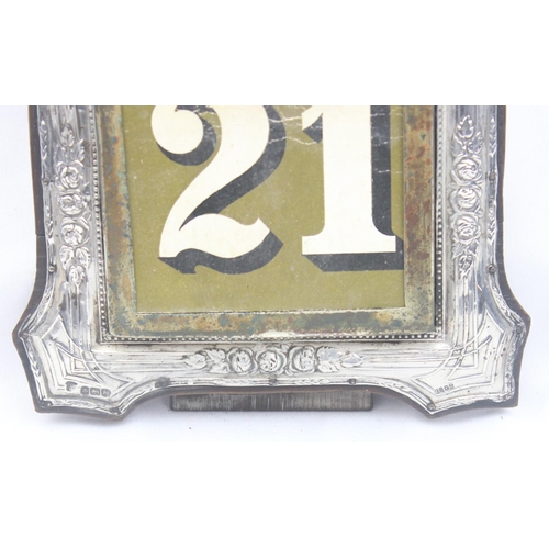 1053 - A silver mounted desktop calendar with paper labels, missing dates 11 & 12, frame marked for Birming... 