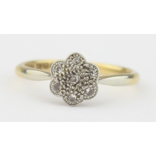 1103 - A vintage 18ct gold, platinum and diamond floral set ring, marked 18ct and XRF confirmed, approx siz... 