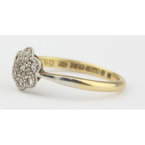 1103 - A vintage 18ct gold, platinum and diamond floral set ring, marked 18ct and XRF confirmed, approx siz... 