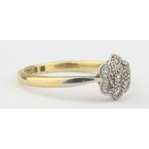 1103 - A vintage 18ct gold, platinum and diamond floral set ring, marked 18ct and XRF confirmed, approx siz... 