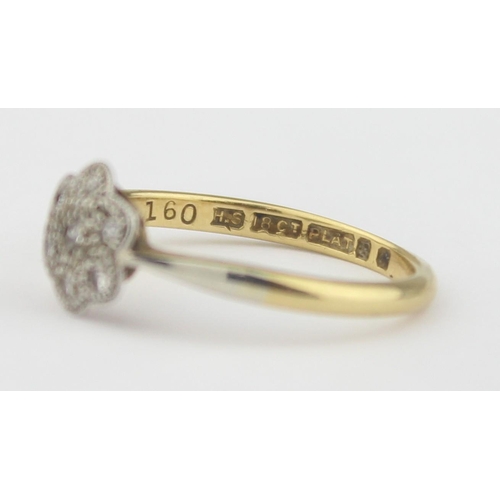 1103 - A vintage 18ct gold, platinum and diamond floral set ring, marked 18ct and XRF confirmed, approx siz... 