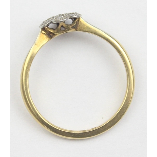 1103 - A vintage 18ct gold, platinum and diamond floral set ring, marked 18ct and XRF confirmed, approx siz... 